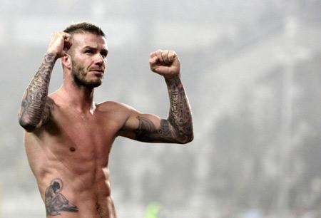 AC&nbsp;Milan&nbsp;David&nbsp;Beckham&nbsp;celebrates&nbsp;at&nbsp;the&nbsp;end&nbsp;of&nbsp;the&nbsp;match&nbsp;against&nbsp;Juventus&nbsp;during&nbsp;their&nbsp;Serie&nbsp;A&nbsp;soccer&nbsp;match&nbsp;at&nbsp;Olympic&nbsp;stadium&nbsp;in&nbsp;Turin,&nbsp;January&nbsp;10,&nbsp;2010.&nbsp;AC&nbsp;Milan&nbsp;won&nbsp;3-0.[Photo/Agencies]