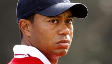 U.S.&nbsp;team&nbsp;member&nbsp;Tiger&nbsp;Woods&nbsp;watches&nbsp;play&nbsp;as&nbsp;he&nbsp;stands&nbsp;on&nbsp;the&nbsp;sixth&nbsp;hole&nbsp;during&nbsp;his&nbsp;foursome&nbsp;match&nbsp;at&nbsp;the&nbsp;Presidents&nbsp;Cup&nbsp;golf&nbsp;tournament&nbsp;at&nbsp;Harding&nbsp;Park&nbsp;golf&nbsp;course&nbsp;in&nbsp;San&nbsp;Francisco,&nbsp;California,&nbsp;in&nbsp;this&nbsp;October&nbsp;8,&nbsp;2009&nbsp;file&nbsp;photo.(Xinhua/Reuters&nbsp;File&nbsp;Photo)