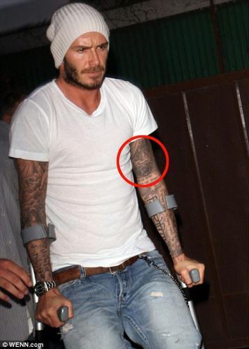 In&nbsp;memory:&nbsp;David&nbsp;Beckham&nbsp;in&nbsp;Los&nbsp;Angeles&nbsp;yesterday&nbsp;on&nbsp;crutches&nbsp;sporting&nbsp;a&nbsp;new&nbsp;tattoo&nbsp;in&nbsp;tribute&nbsp;to&nbsp;his&nbsp;late&nbsp;grandfather&nbsp;Joseph&nbsp;West