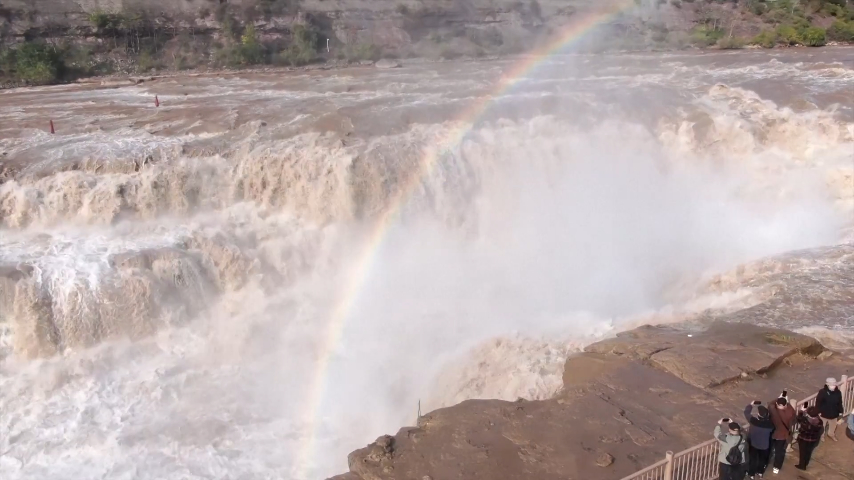 Rainbow creates halo over Yellow River's Hukou Waterfall