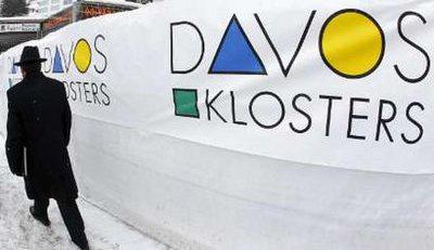 A&nbsp;man&nbsp;walks&nbsp;past&nbsp;a&nbsp;banner&nbsp;advertising&nbsp;the&nbsp;Swiss&nbsp;mountain&nbsp;resort&nbsp;of&nbsp;Davos,&nbsp;the&nbsp;venue&nbsp;of&nbsp;the&nbsp;World&nbsp;Economic&nbsp;Forum&nbsp;(WEF)&nbsp;January&nbsp;26,&nbsp;2010.&nbsp;REUTERS/Arnd&nbsp;Wiegmann