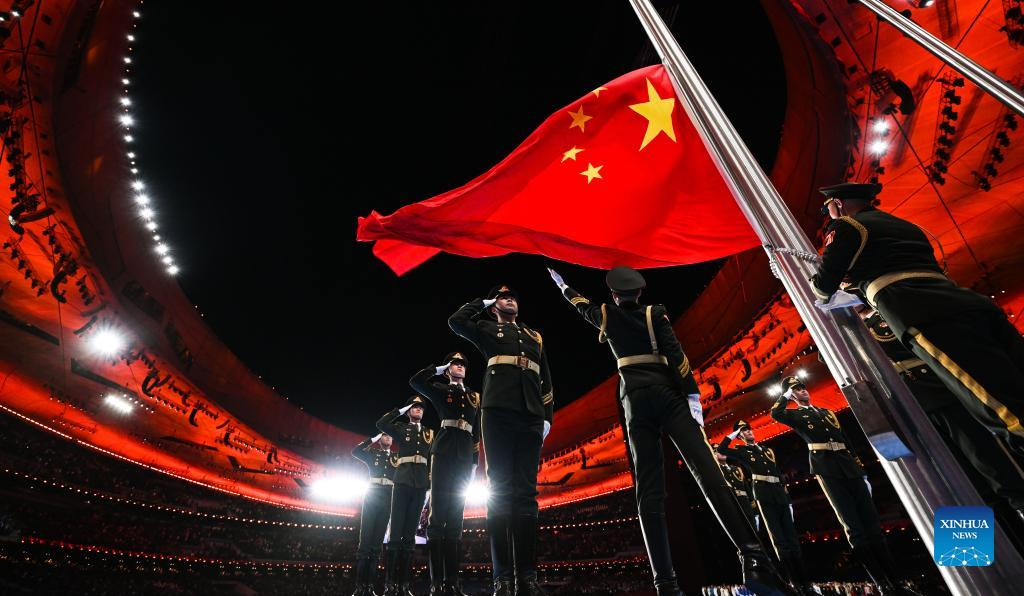 Chinese national flag is raised during the opening ceremony of the Beijing 2022 Olympic Winter Games at the National Stadium in Beijing, capital of China, Feb. 4, 2022. (Xinhua/Ju Huanzong)